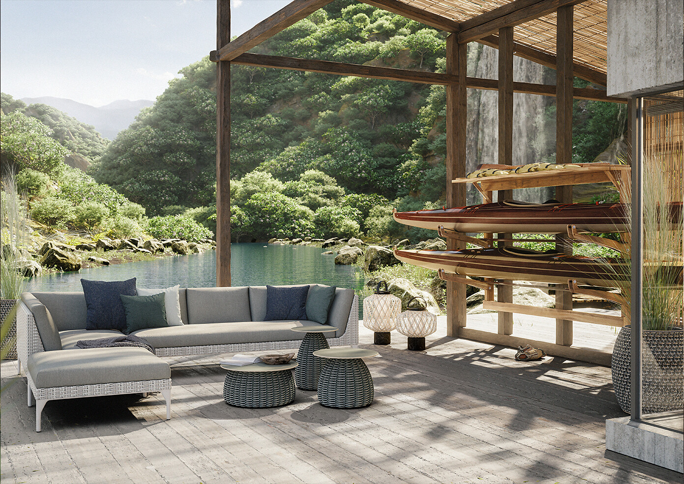 Große Sofalandschaft und Beistelltische auf Holzterrasse vor See und Surfboard-Regal im Hintergrund